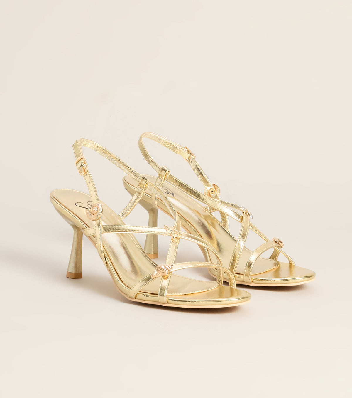 On Vacay Sea Shell Charm Metallic Heels